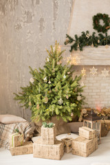 Fototapeta na wymiar tree by the fireplace. green tree. new year. Christmas decor. decorated Christmas tree