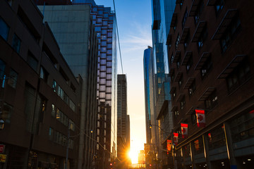 Toronto, Canada-July 20, 2017: Taxi in Toronto downtown servicing clients on busy streets of city...