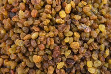 Golden raisins presented in the form of texture.