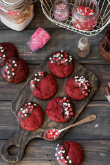 Cookies red velvet in chocolate glaze with the decor of sugar hearts
