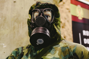 Valencia, Spain - January 4, 2019: Antigas mask shown by a military mannequin in an exhibition.