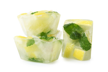 Ice cubes with mint and lemon on white background