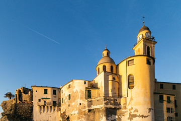 Fototapeta na wymiar Basilica Santa Maria Assunta kissed by a warm winter sun in January. Camogli, Ligury