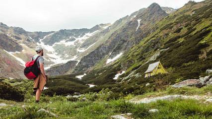 Naklejka premium Mountaineer hiking the Rodna Mountains