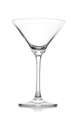 Empty crystal martini glass on white background
