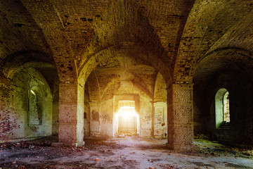 Fototapeta premium Large ancient vaulted hall of abandoned building