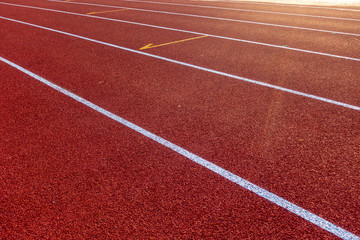 Red running track in stadium