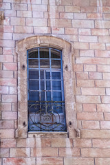 Fototapeta na wymiar Mesh covered window in Old City Jerusalem