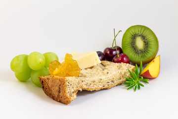 Fresh fruits for breakfast with wholemeal bread.