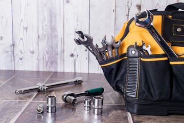 wrenches in  yellow bag closeup