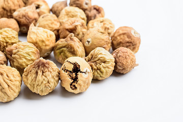 Dried figs on white background