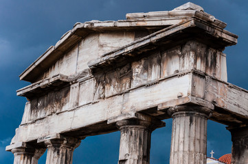 The Gate of Athena Archegetis, the Roman Agora, was the entrance to the market, a large columned structure that looks like the front of a temple with small catholic church in between