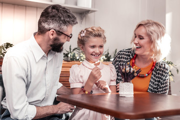 Delighted nice family spending a day together