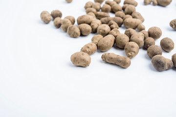 A dish of steamed yam beans on white background / TCM health supplements