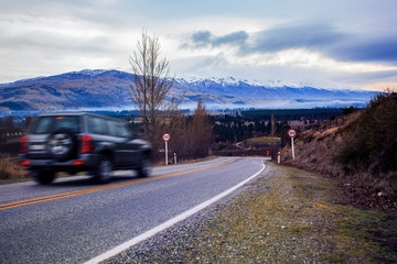 suv car driving on traveling new zealand highway