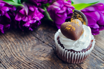 Cupcake with purple ultraviolet tulips