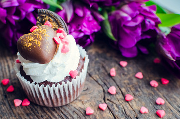 Cupcake with purple ultraviolet tulips