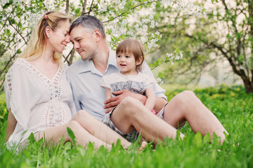 Fototapeta premium happy family on spring garden