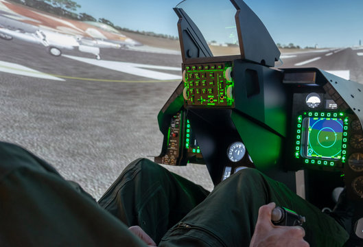 Undefined man play a multirole fighter aircraft simulator