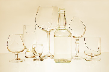 Broken wine glasses on a light background