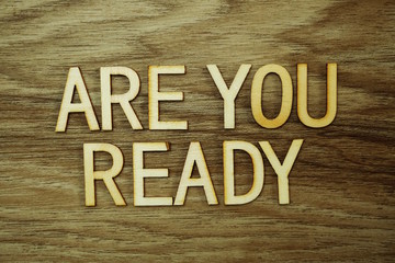 Are You Ready text message on wooden background