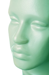 Male plastic mannequin. Face. Close-up. On a white background