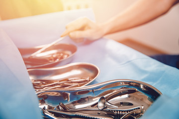 Doctor takes sterile devices for cleaning. Concept medicine equipment