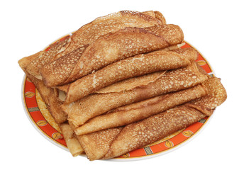 Plate with fried  pancakes in rural style isolated
