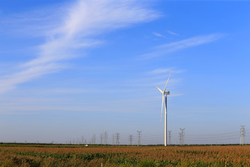 Windmill in the blue sky background