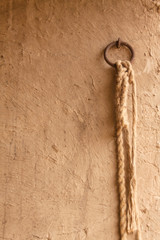 old rope on clay background