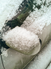 Snow on a car in winter
