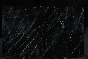 Natural stone is black marble with an interesting pattern called Nero Marquina
