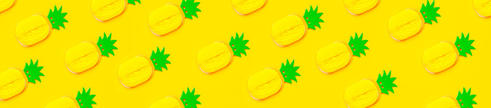 Creative summer pattern bright sweet tropical pineapple of paper on yellow background Flat lay top view copy space. Minimalistic food concept, origami paper fruit. Pineapple background