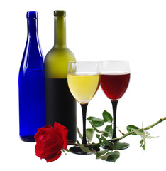 Two glasses of white and red wine, a red rose . Isolated on white