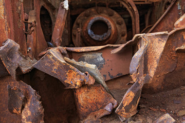 Internal parts of decommissioned marine ship that was cut and left on the shore.