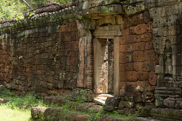 Doorway in stone wall of Banteay Kdei