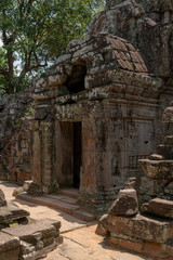 Entrance to stone temple with holed roof