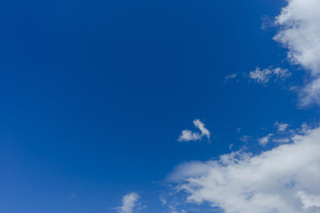 Beautiful white clouds with blue sky background.