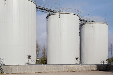 Exterior of oil storage tanks on the agricultural plant.