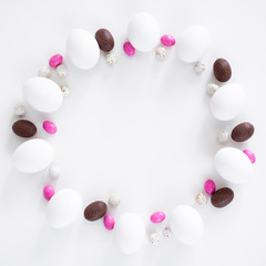 Easter background - close up frame by eggs and sweets