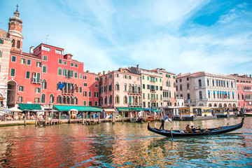 Fototapeta na wymiar Beautiful landscape with gondola on the canal in Venice, Italy. Landmarks. The city of pilgrimage.