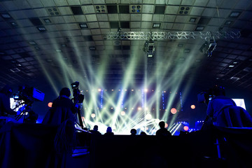 Fototapeta na wymiar A group of cameramen working during the concert.