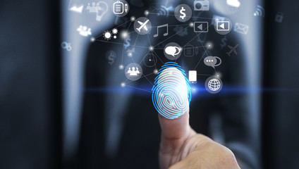 Businessman login with fingerprint scanning technology. fingerprint to identify personal, security...