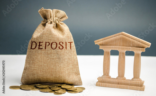Bag Of Money With The Word Deposit Near Bank Amount