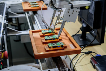 Industrial robot in welding mobile phone circuit board