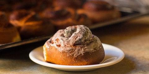 buns  with cinnamon - Cinnabon cooking process. (food background). copy space