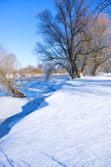 Winter river in sunny day