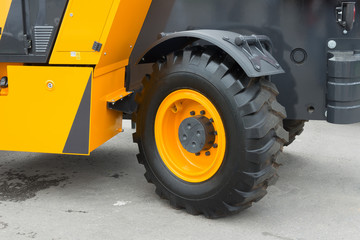 Big truck wheel of the large construction vehicle