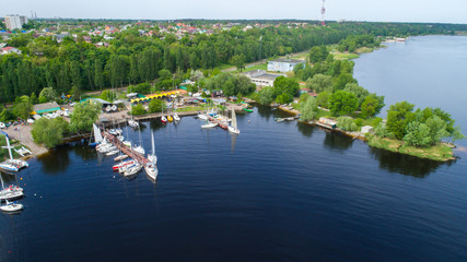 river yacht club with lot of yachts showed from drone , aerial view 