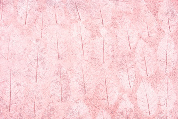 Blurred for Background.Pink cement floor with pattern surface made of leaves.